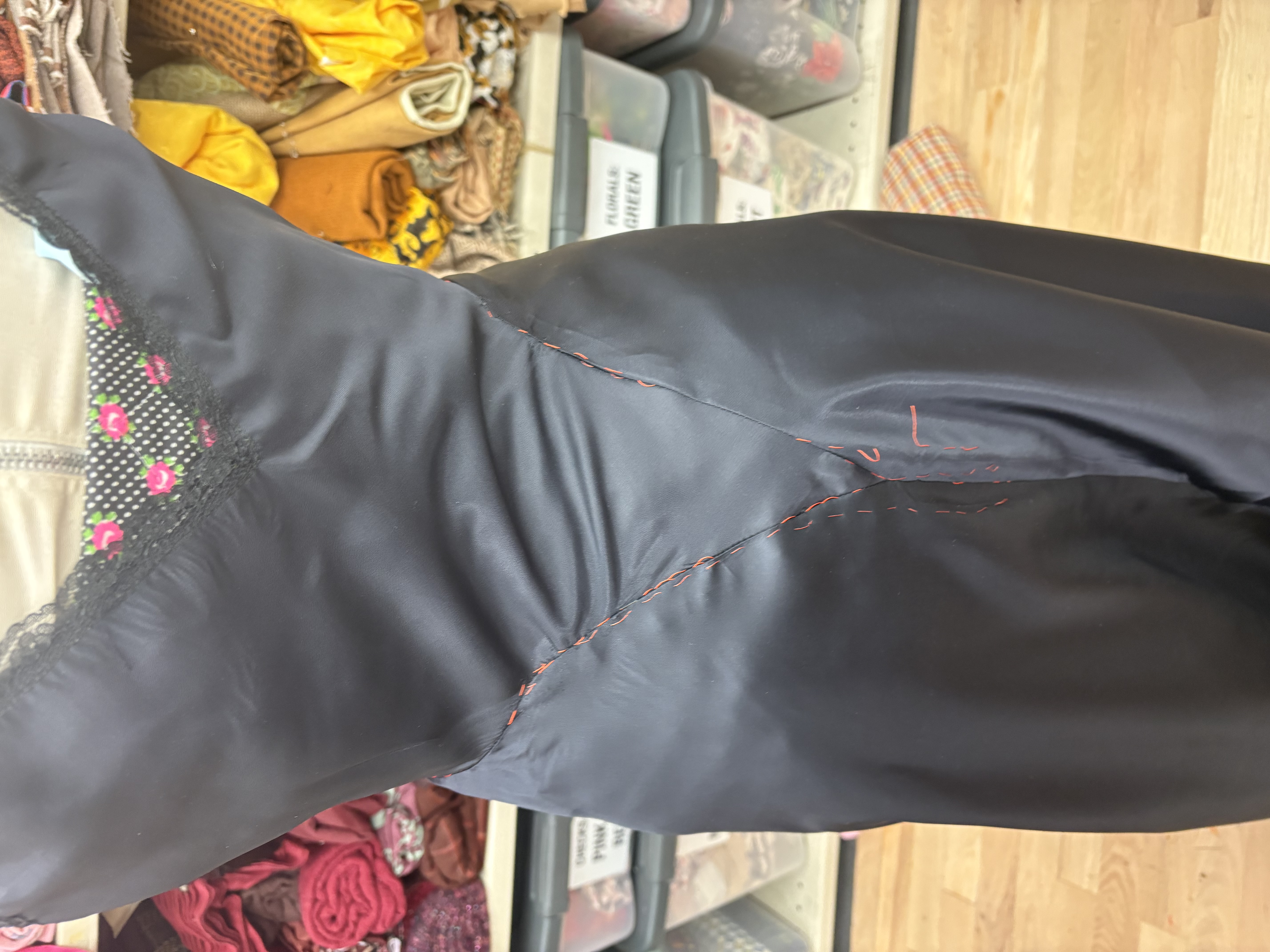 In progress photo with visible thread tracing, front view