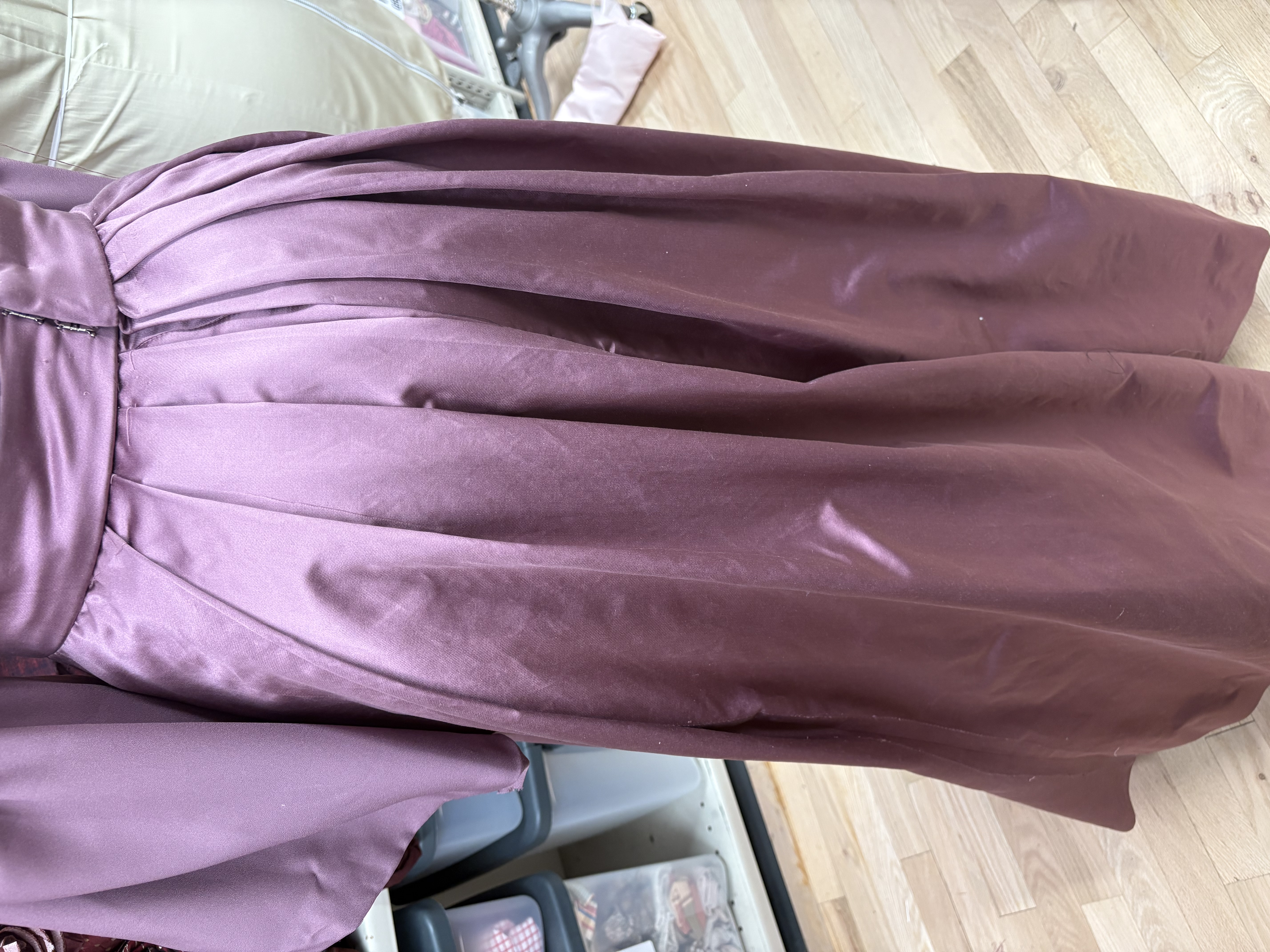 closeup of the pleats at the back of the skirt