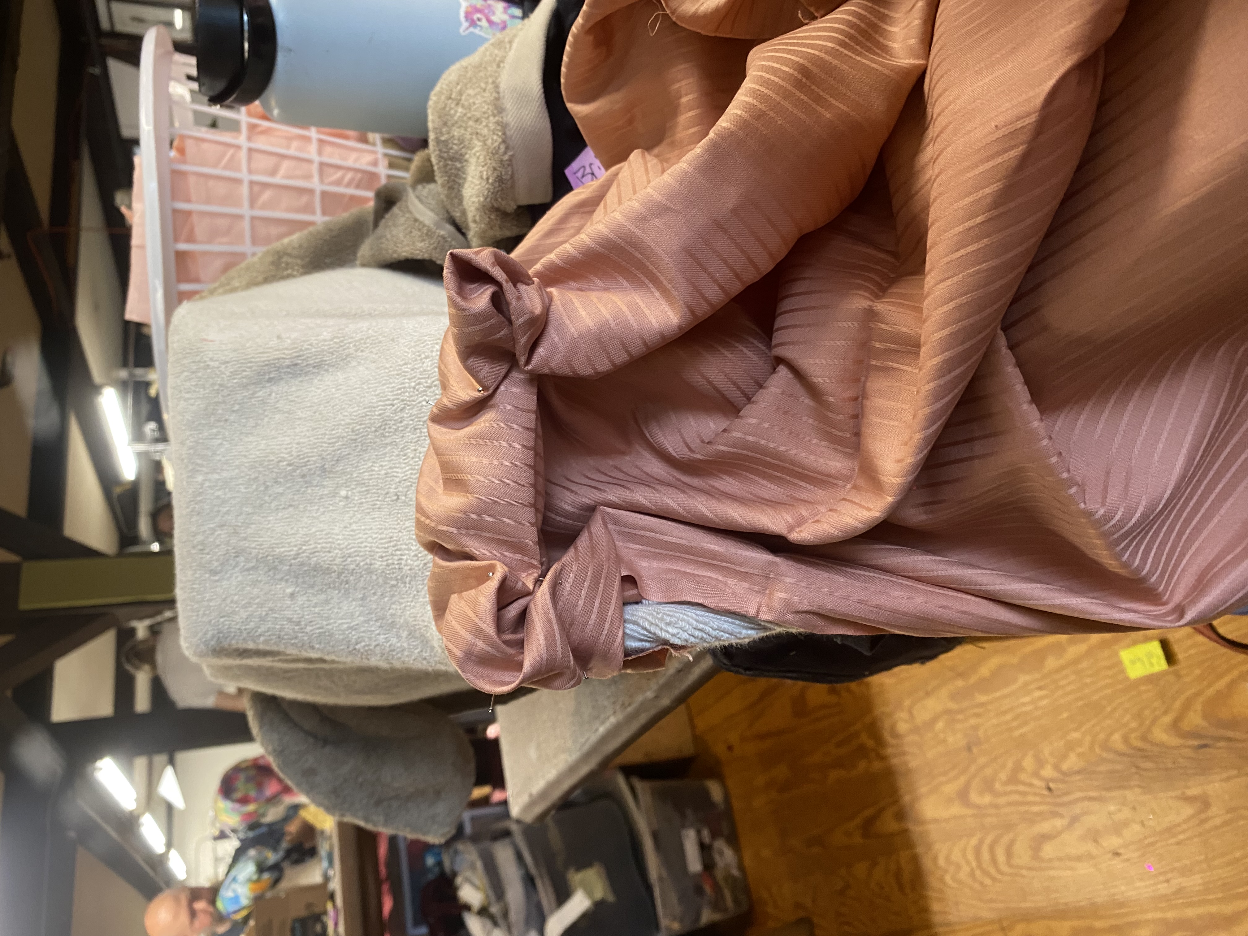 A progress photo of the pleating for the nose