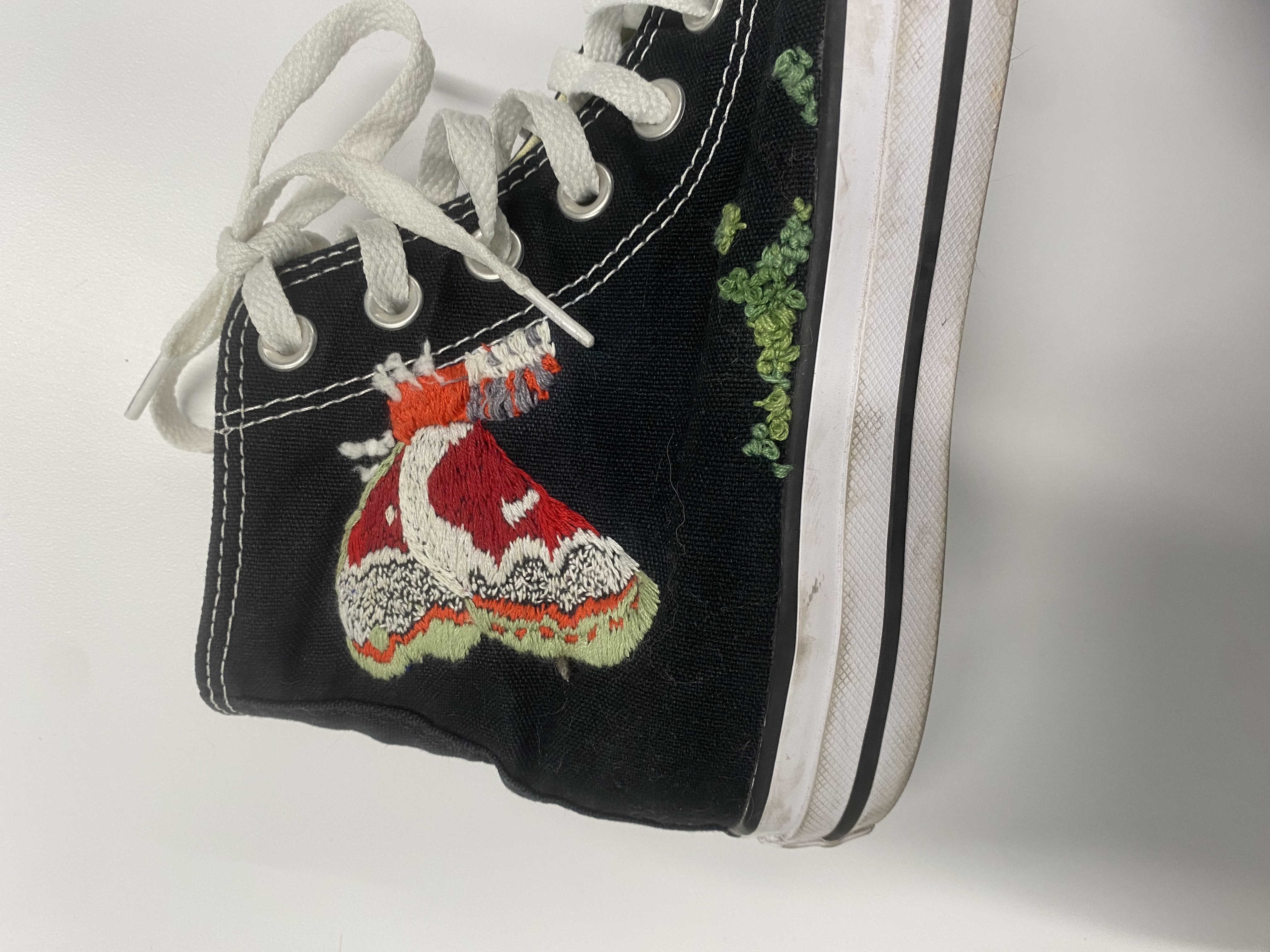an embroidered moth