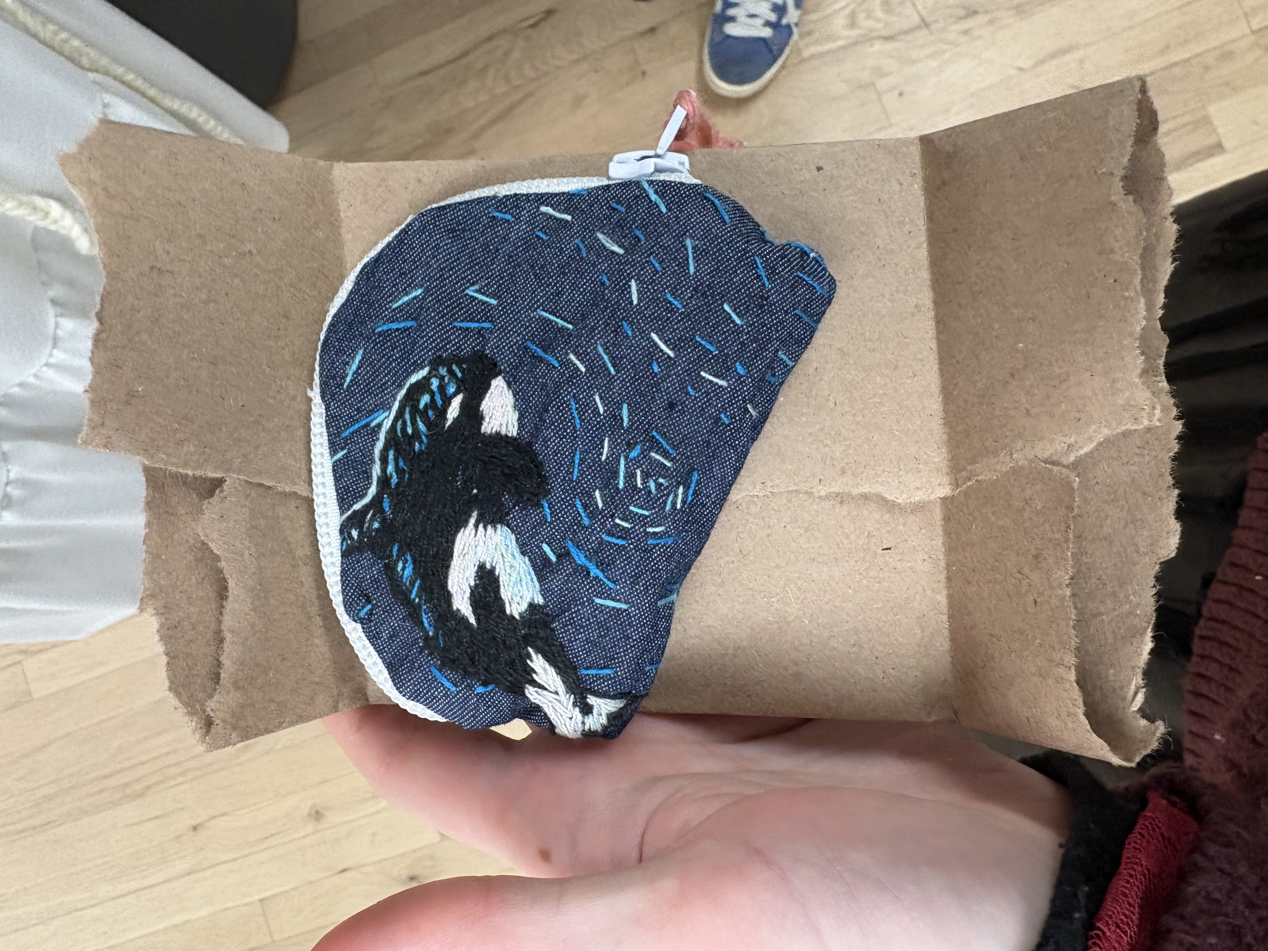 an embroidered orca